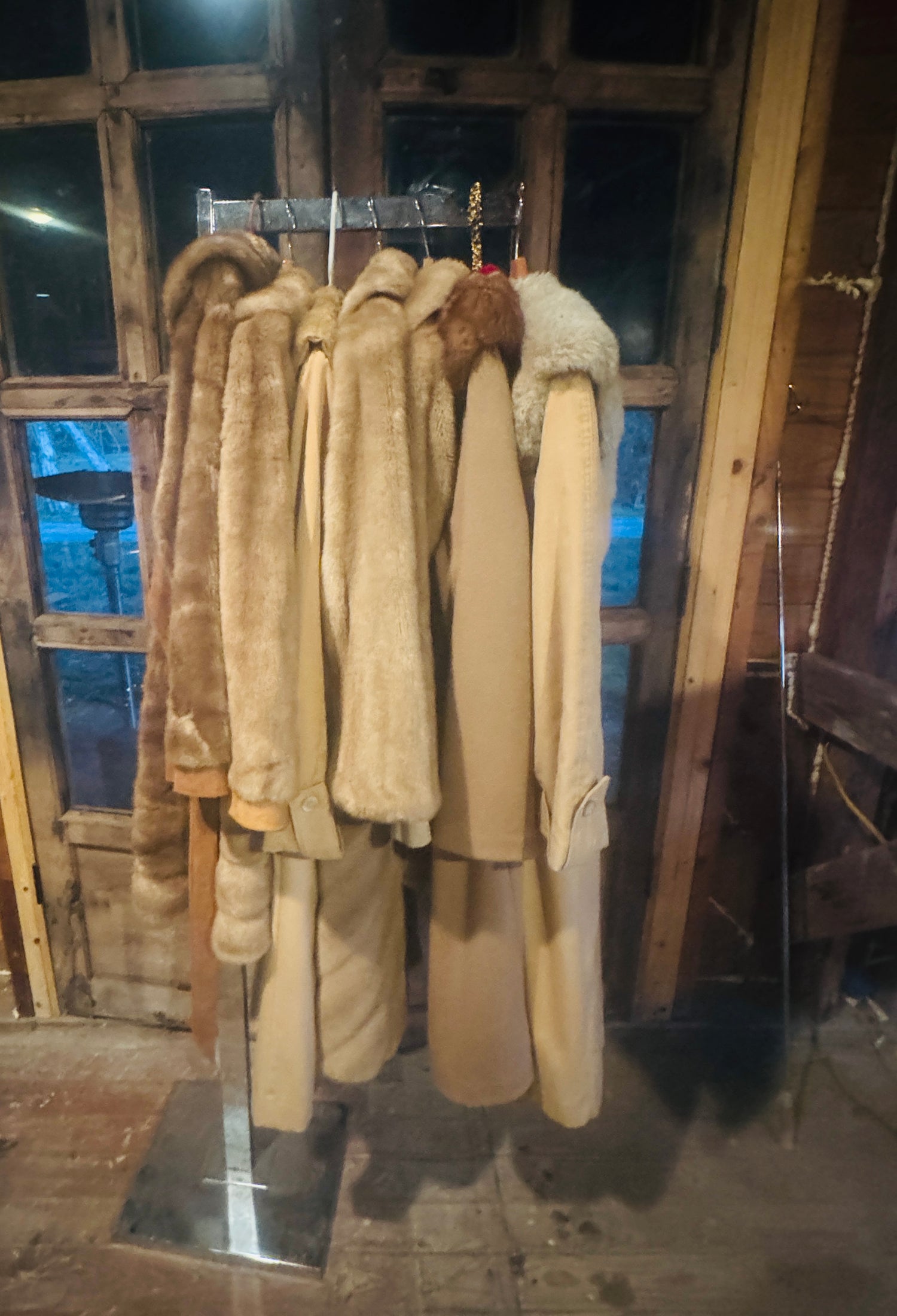 Rack of Some Available Coats